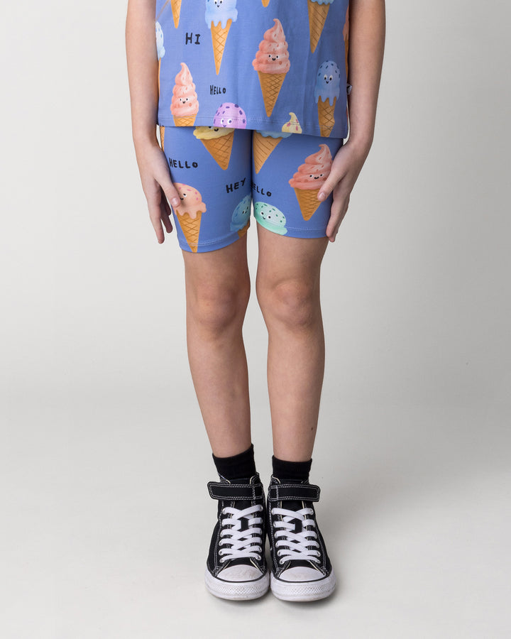 Kid wearing the Happy Icecreams Bike Pant in cornflower, front view close up