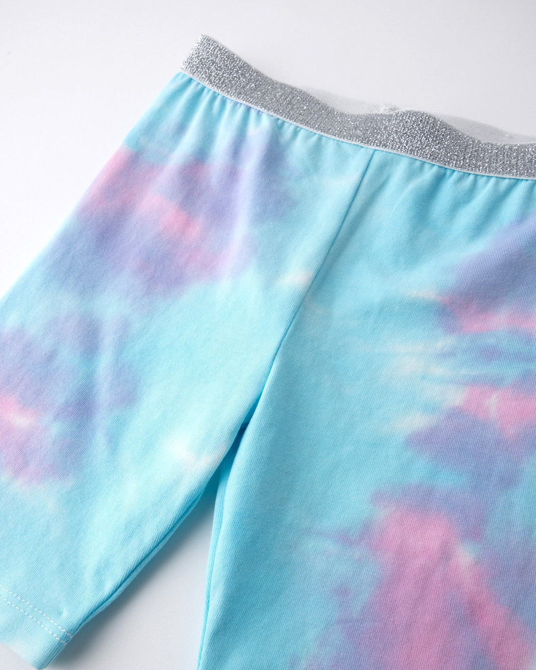 Close up detail of the Tie Dye Bike Pant in multi