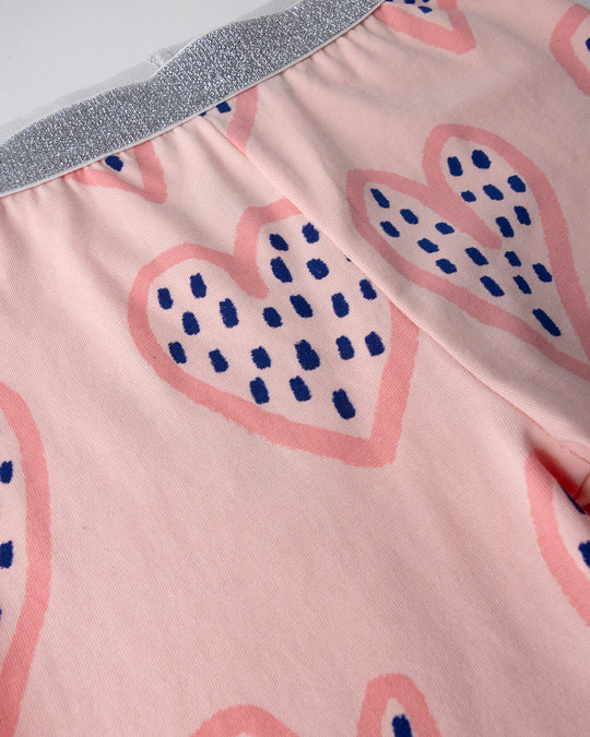 Close up detail of the Speckle Heart Bike Pant in pink