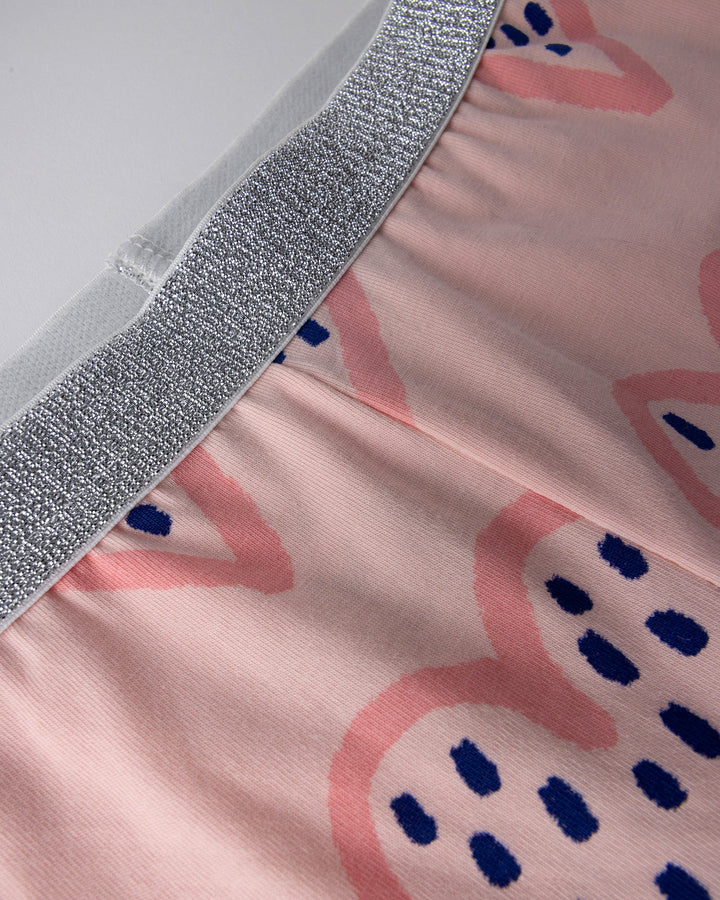Close up detail of the Speckle Heart Bike Pant in pink