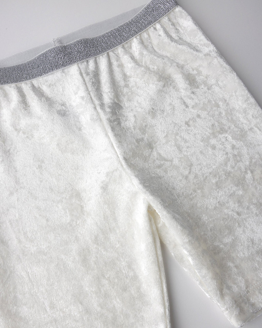 Close up detail of the Velvet Bike Pant in cream