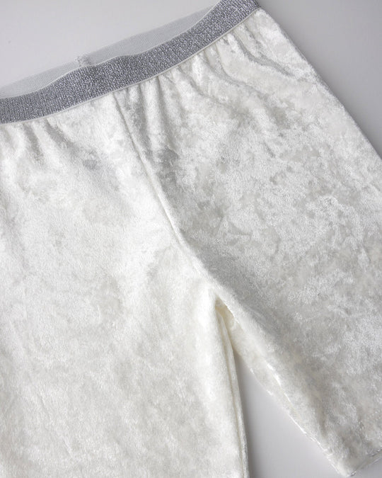 Close up detail of the Velvet Bike Pant in cream