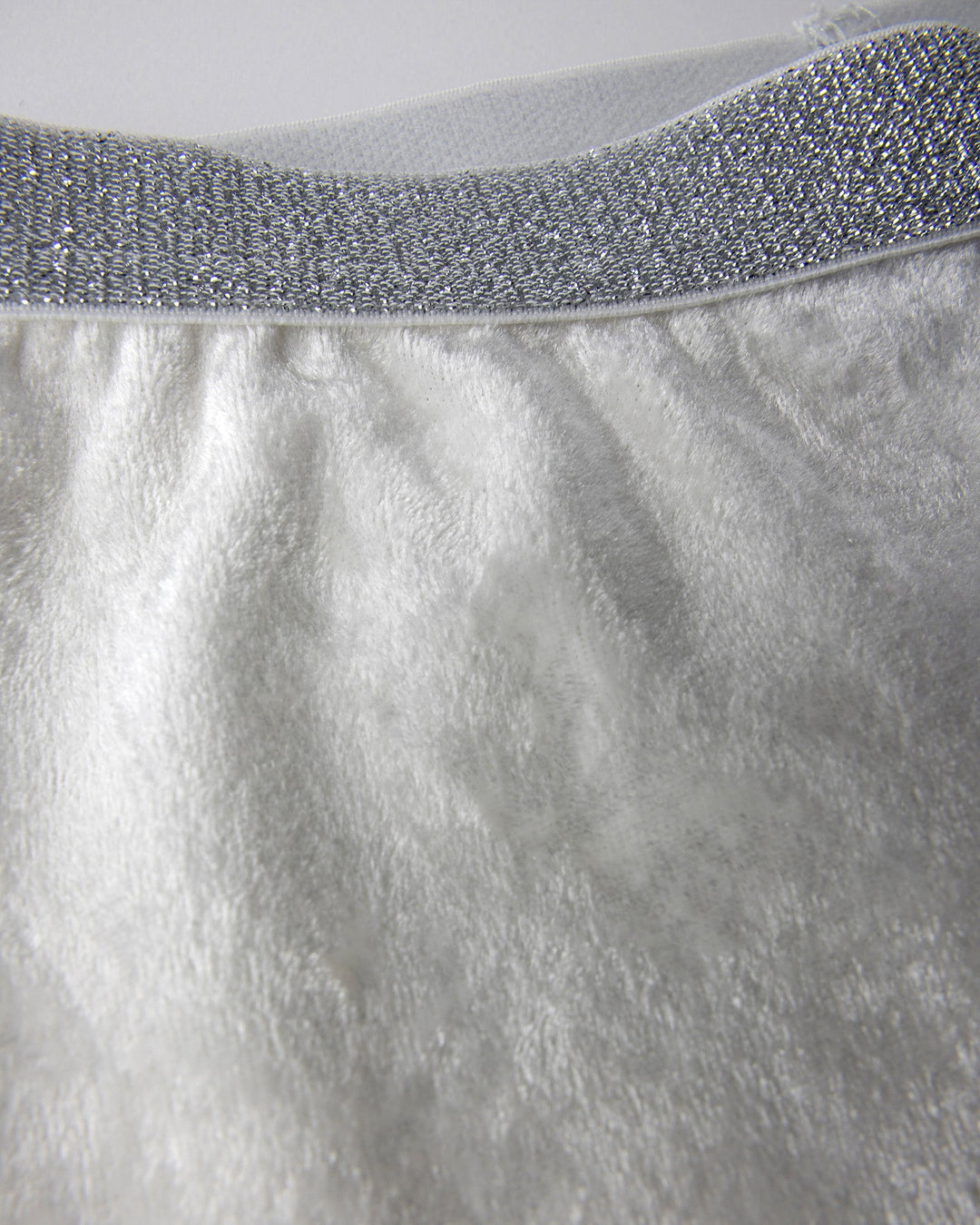 Close up detail of the Velvet Bike Pant in cream