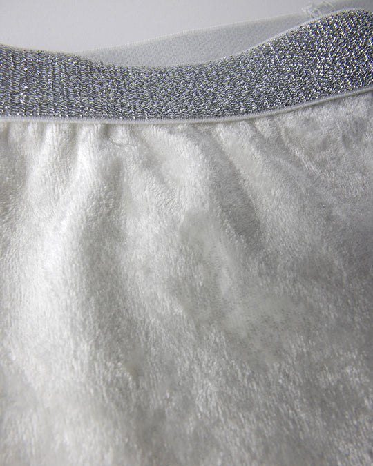 Close up detail of the Velvet Bike Pant in cream