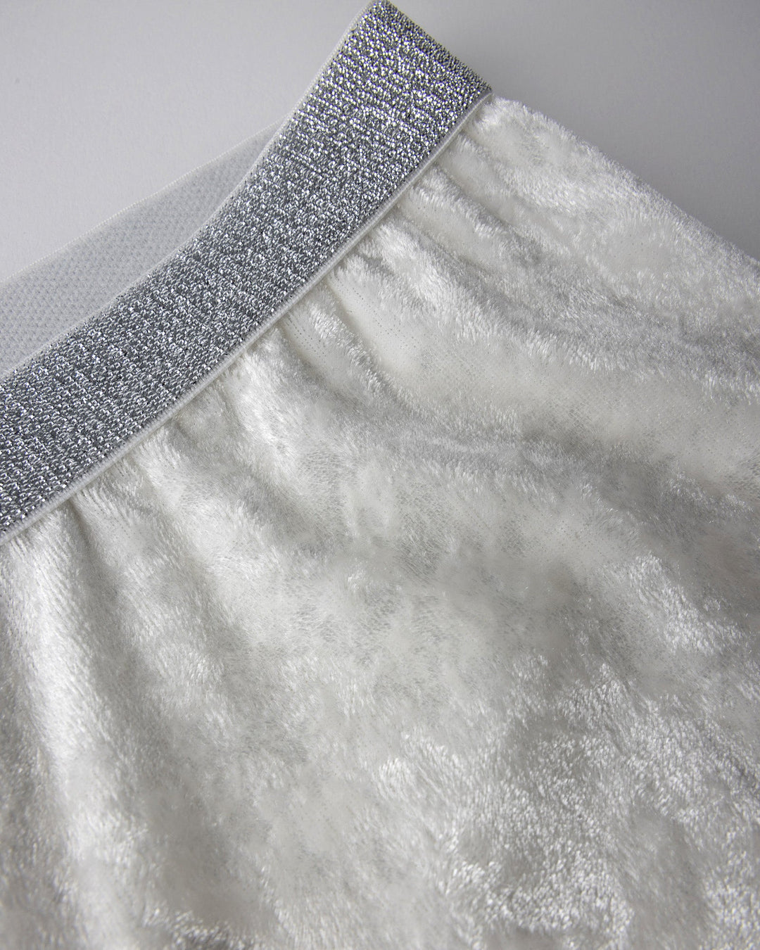 Close up detail of the Velvet Bike Pant in cream