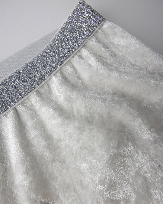 Close up detail of the Velvet Bike Pant in cream
