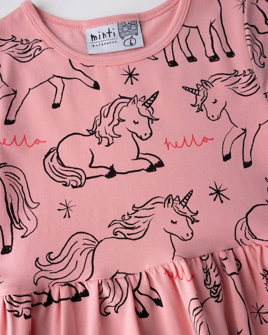 Close up of the Hello Unicorns Dress print in pink