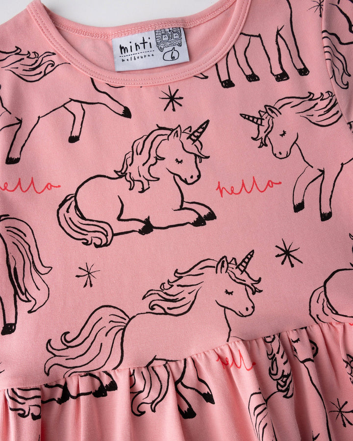 Close up of the Hello Unicorns Dress print in pink