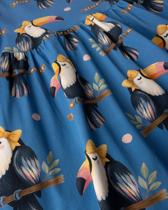 Close up of the Hello Toucan Dress print in aqua