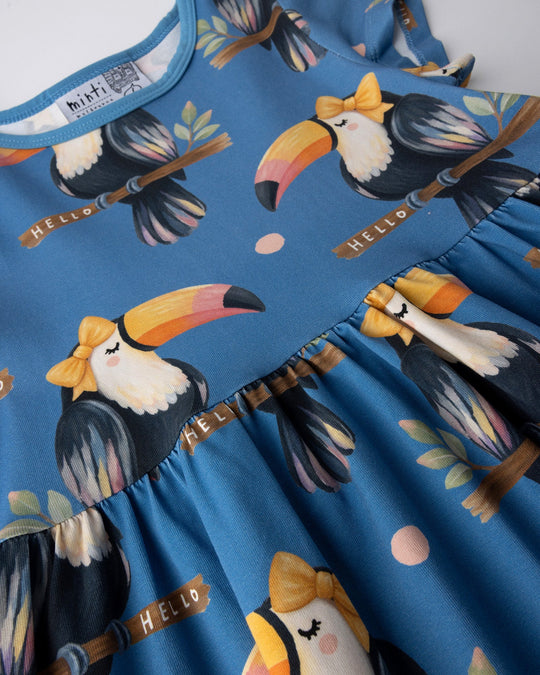 Close up of the Hello Toucan Dress print in aqua