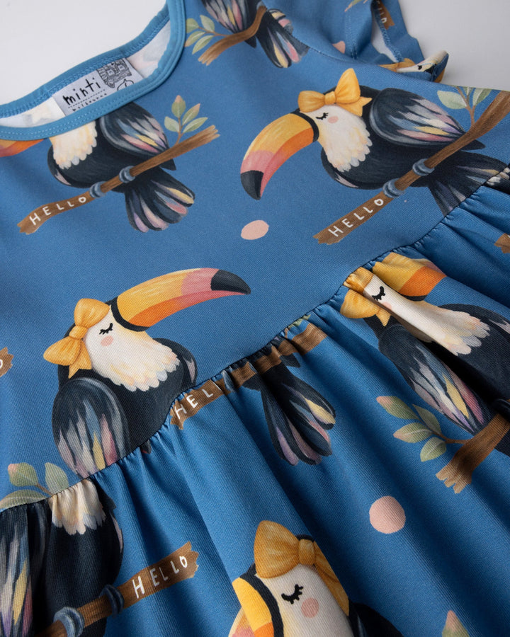 Close up of the Hello Toucan Dress print in aqua