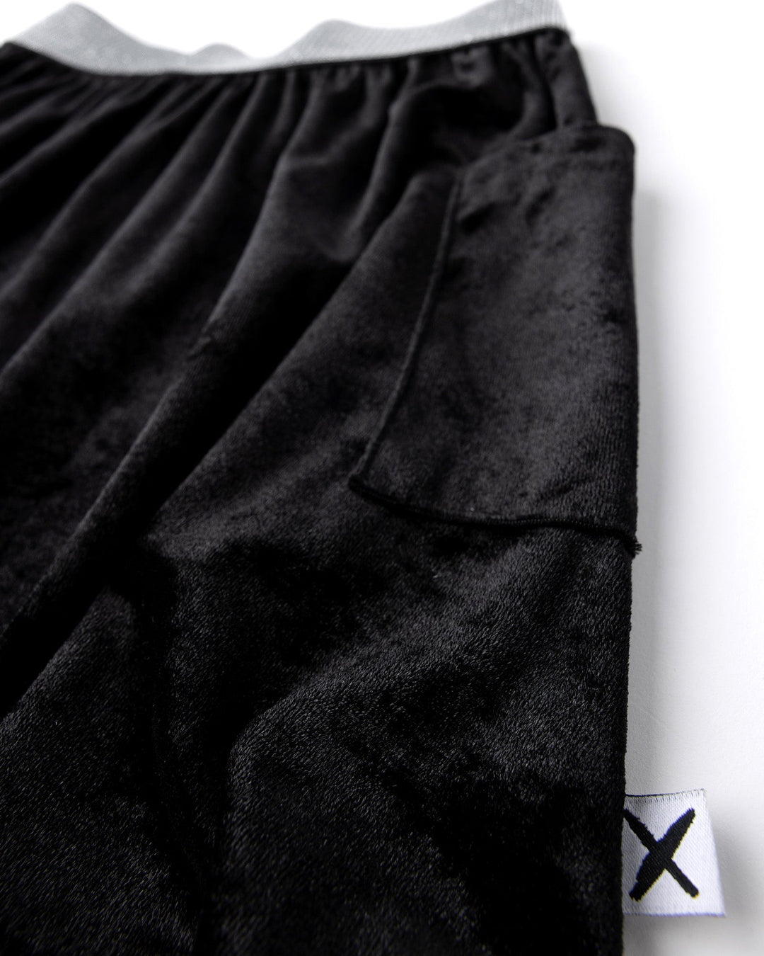 Close up detail of the Velvet Skirt in black