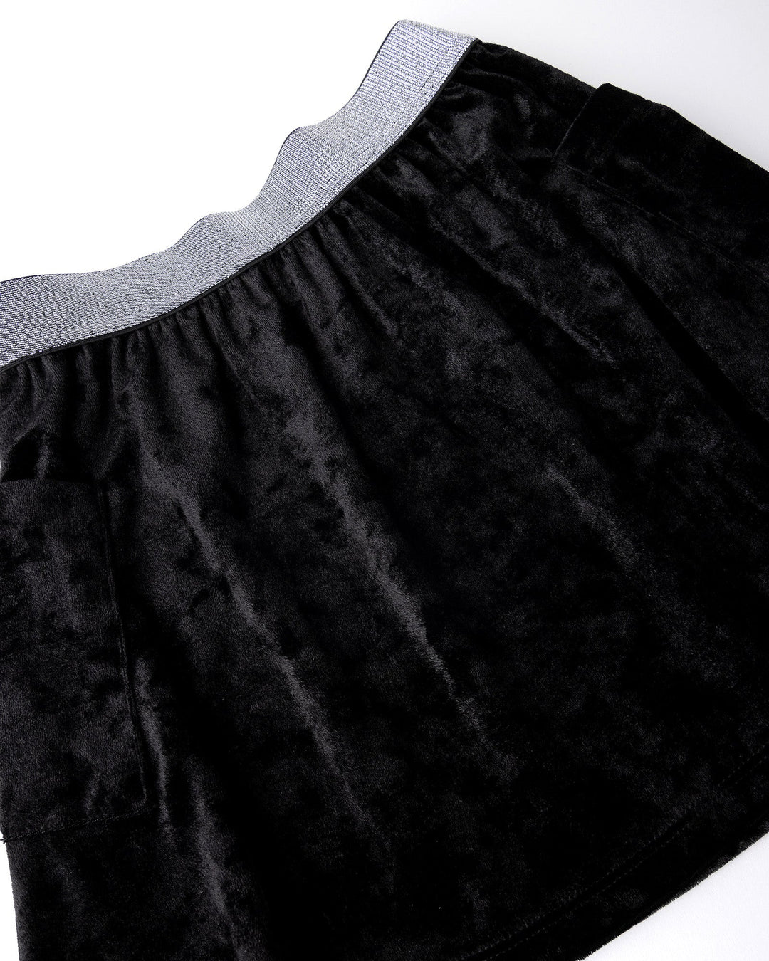 Close up detail of the Velvet Skirt in black