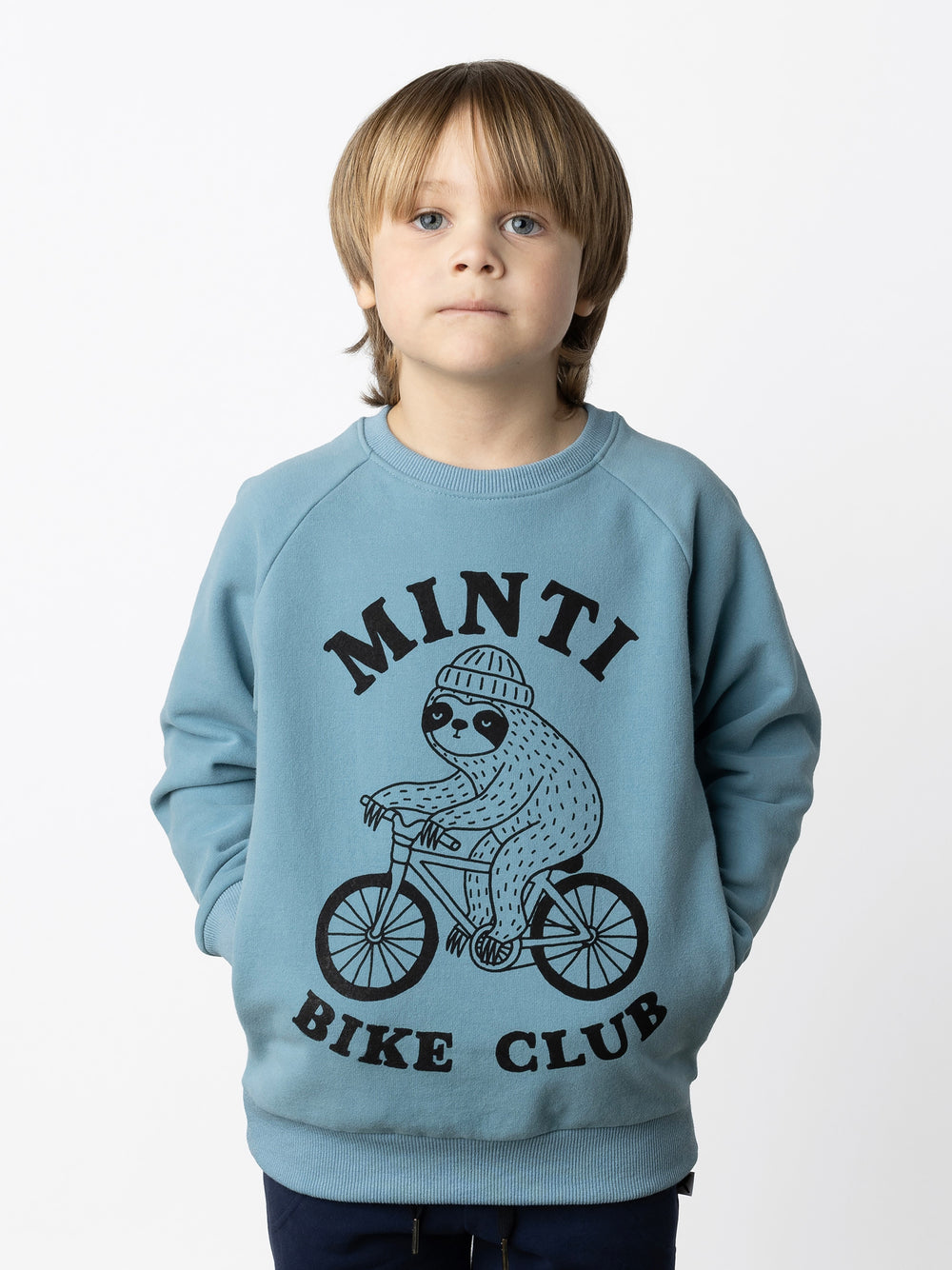 Minti kids clothing. Super cool and comfy crew with hidden side pockets. Perfect for keeping hands warm! 330 Gram // Brushed Inside // 95% Cotton // 5% Elastane.