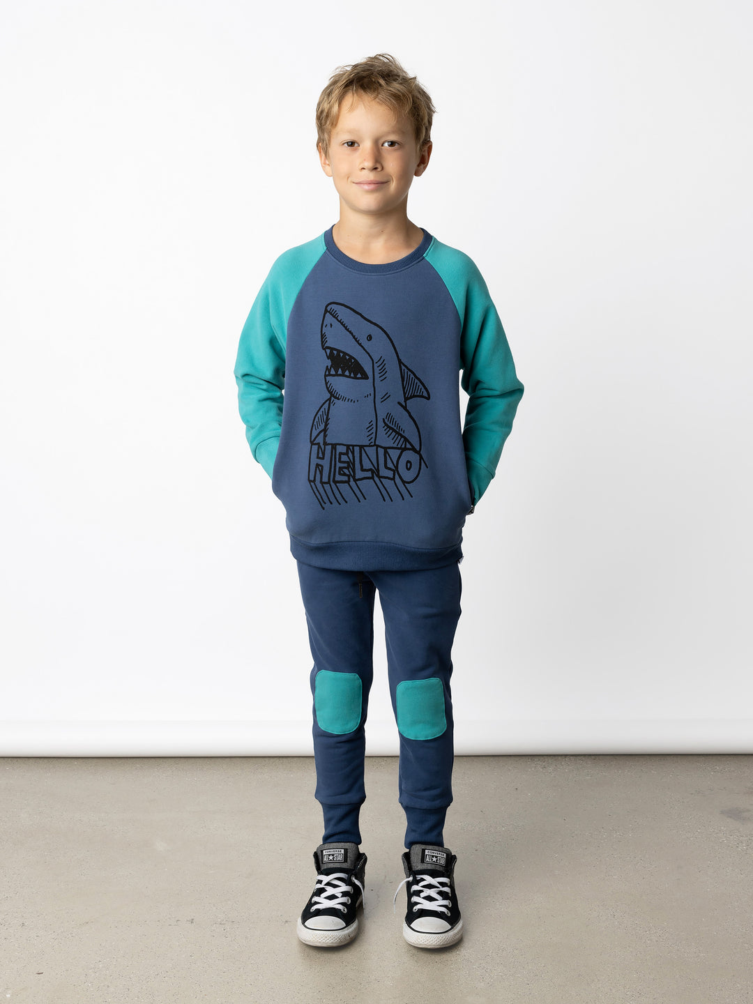 Minti kids clothing. Super cool and comfy crew with hidden side pockets. Perfect for keeping hands warm! 330 Gram // Brushed Inside // 95% Cotton // 5% Elastane.