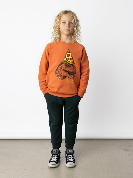 Minti kids clothing. Super cool and comfy crew with hidden side pockets. Perfect for keeping hands warm! 330 Gram // Brushed Inside // 95% Cotton // 5% Elastane.