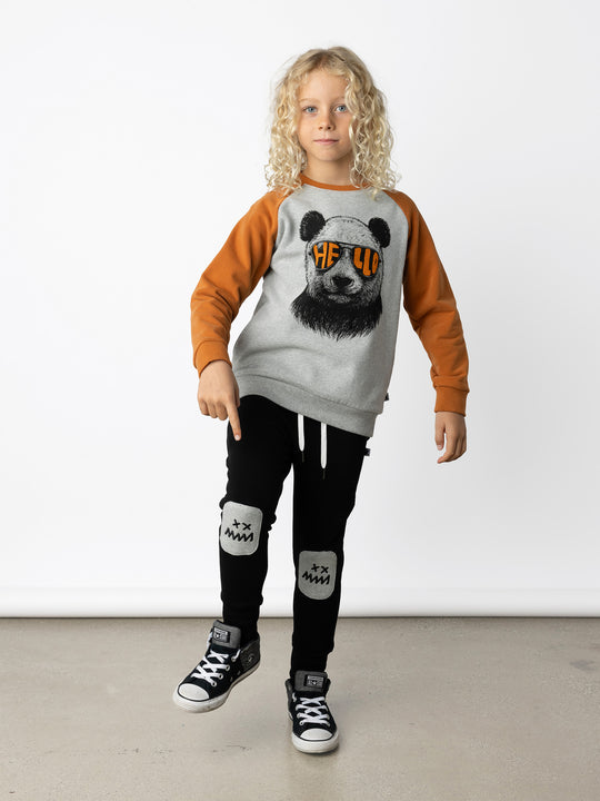 Minti kids clothing. Super cool and comfy crew with hidden side pockets. Perfect for keeping hands warm! 330 Gram // Brushed Inside // 95% Cotton // 5% Elastane.