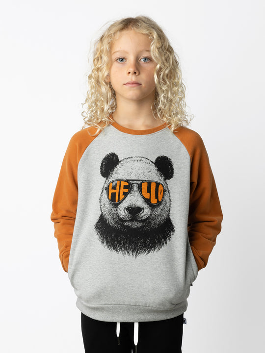 Minti kids clothing. Super cool and comfy crew with hidden side pockets. Perfect for keeping hands warm! 330 Gram // Brushed Inside // 95% Cotton // 5% Elastane.