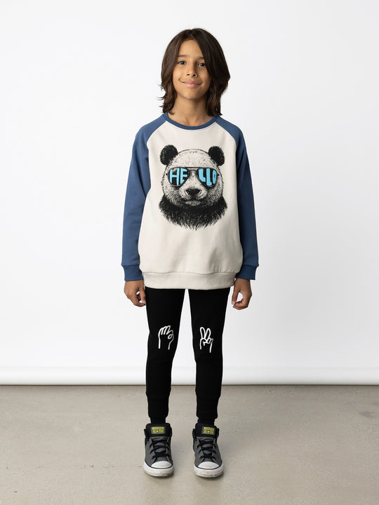 Minti kids clothing. Super cool and comfy crew with hidden side pockets. Perfect for keeping hands warm! 330 Gram // Brushed Inside // 95% Cotton // 5% Elastane.