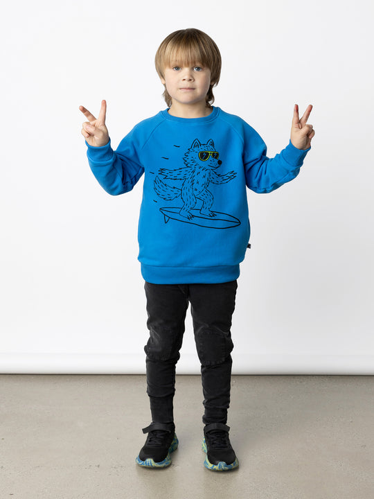 Minti kids clothing. Super cool and comfy crew with hidden side pockets. Perfect for keeping hands warm! 330 Gram // Brushed Inside // 95% Cotton // 5% Elastane.