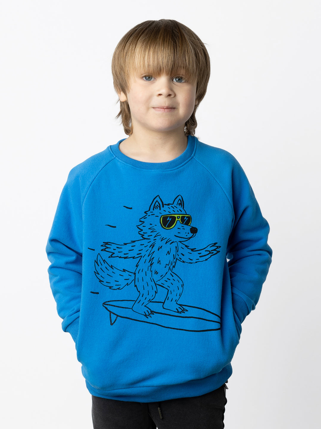 Minti kids clothing. Super cool and comfy crew with hidden side pockets. Perfect for keeping hands warm! 330 Gram // Brushed Inside // 95% Cotton // 5% Elastane.