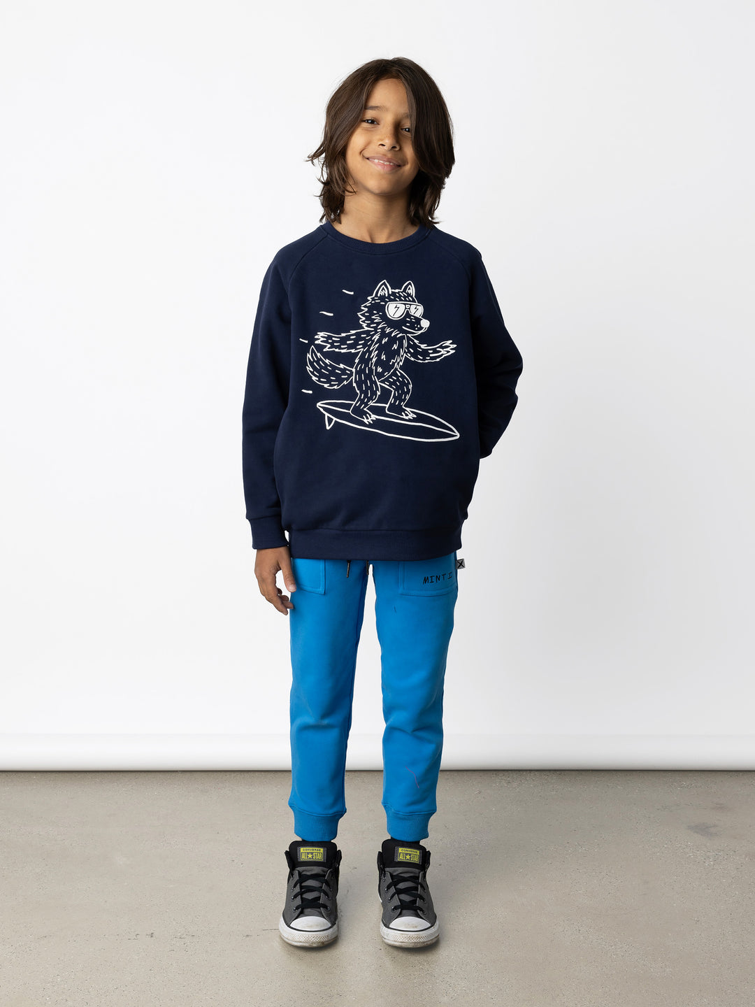 Minti kids clothing. Super cool and comfy crew with hidden side pockets. Perfect for keeping hands warm! 330 Gram // Brushed Inside // 95% Cotton // 5% Elastane.