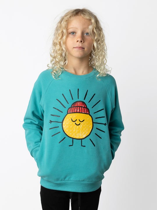 Minti kids clothing. Super cool and comfy crew with hidden side pockets. Perfect for keeping hands warm! 330 Gram // Brushed Inside // 95% Cotton // 5% Elastane.