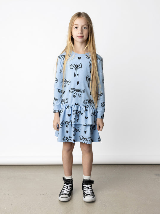 Minti kids clothing. Super pretty tshirting weight dress with skirt frill detail. 180 Gram // 95% Cotton // 5% Elastane.