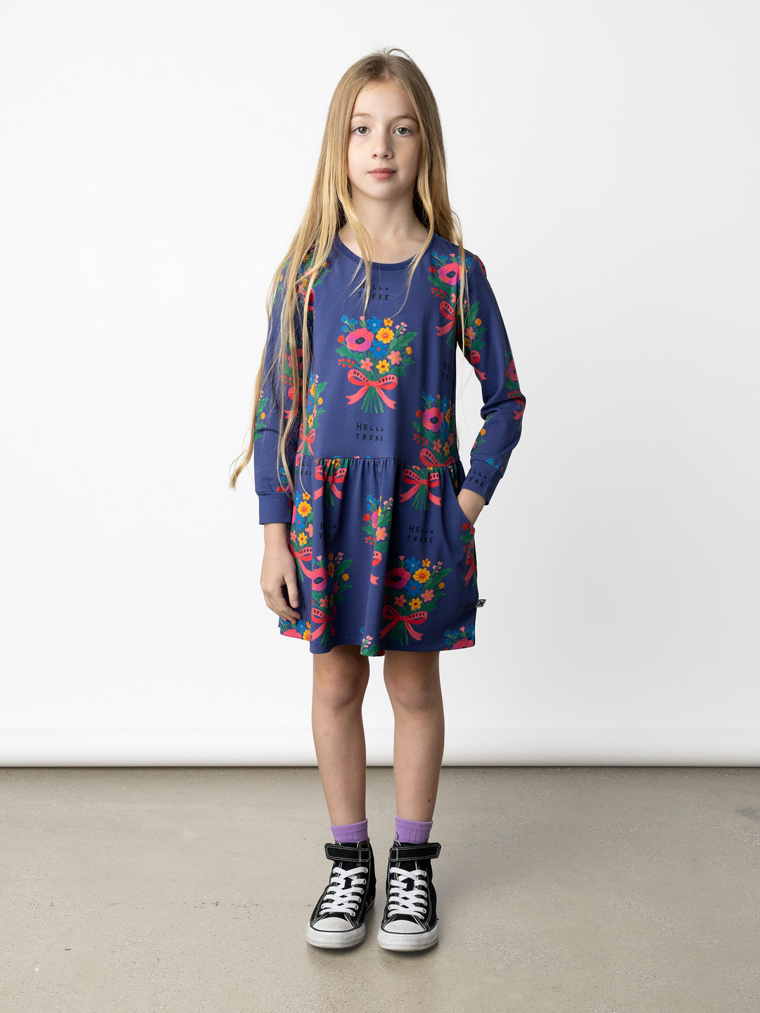 Minti kids clothing. Comfy tshirting weight dress with ruched skirt seam, front pockets and scooped back hem. 190 Gram // 95% Cotton // 5% Elastane.