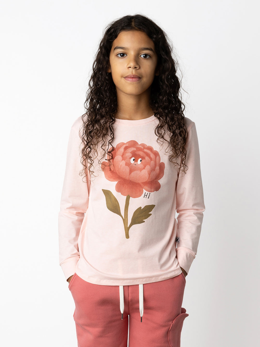 Minti kids clothing. Comfy tee with self cuffs and curved front and back hem. 180 Gram // 95% Cotton // 5% Elastane.