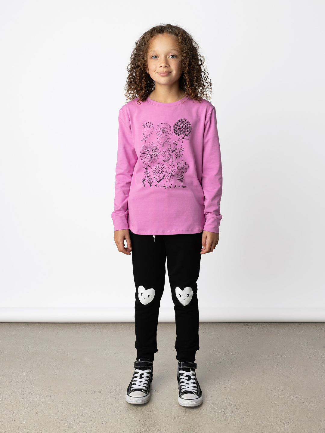 Minti kids clothing. Comfy tee with self cuffs and curved front and back hem. 190 Gram // 95% Cotton // 5% Elastane.
