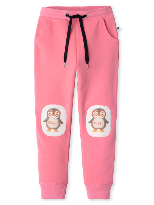 Minti kids clothing. Slim leg trackies with front pockets, shoelace cord and 2x2 rib waistband and cuffs. We recommend to go up a size for this style. 330 Gram // Brushed Inside // 95% Cotton // 5% Elastane.