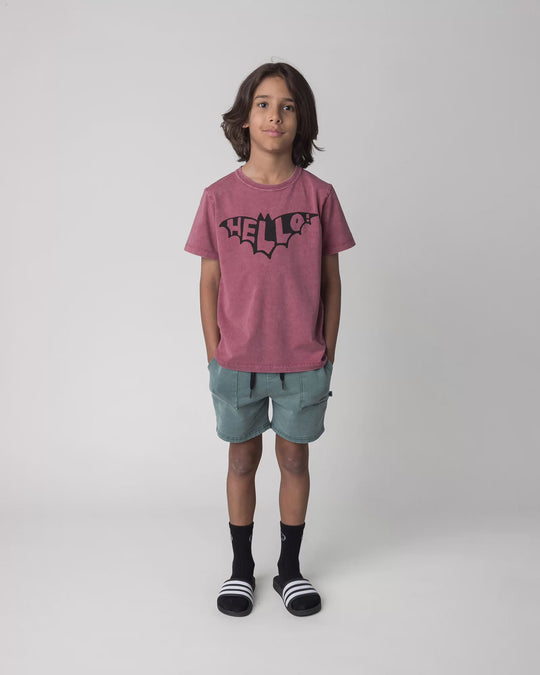 Kid wearing the Blasted Track Short in forest wash, full circle video