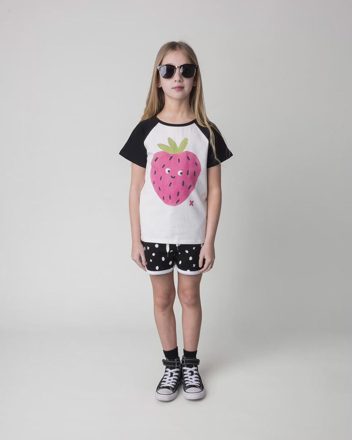 Kid wearing the Happy Strawberry Tee in white and black, full circle video