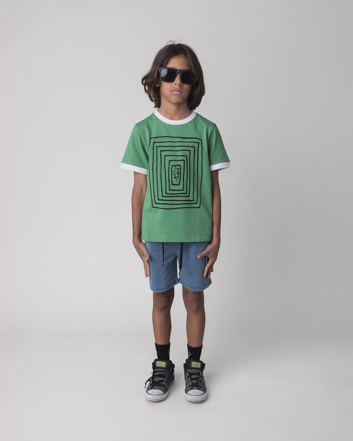 Kid wearing the Hidden Panda Tee in turf and white, full circle video