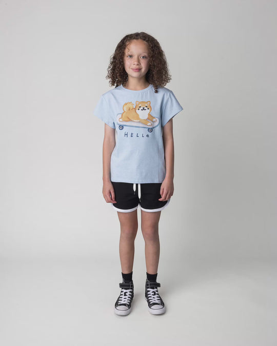 Kid wearing the Skate Puppy Tee in light blue marle, full circle video