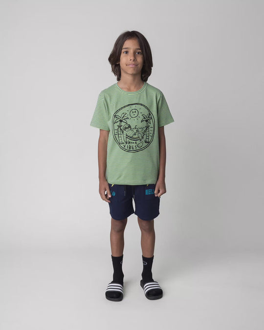 Kid wearing the Badges Short in ink, full circle video