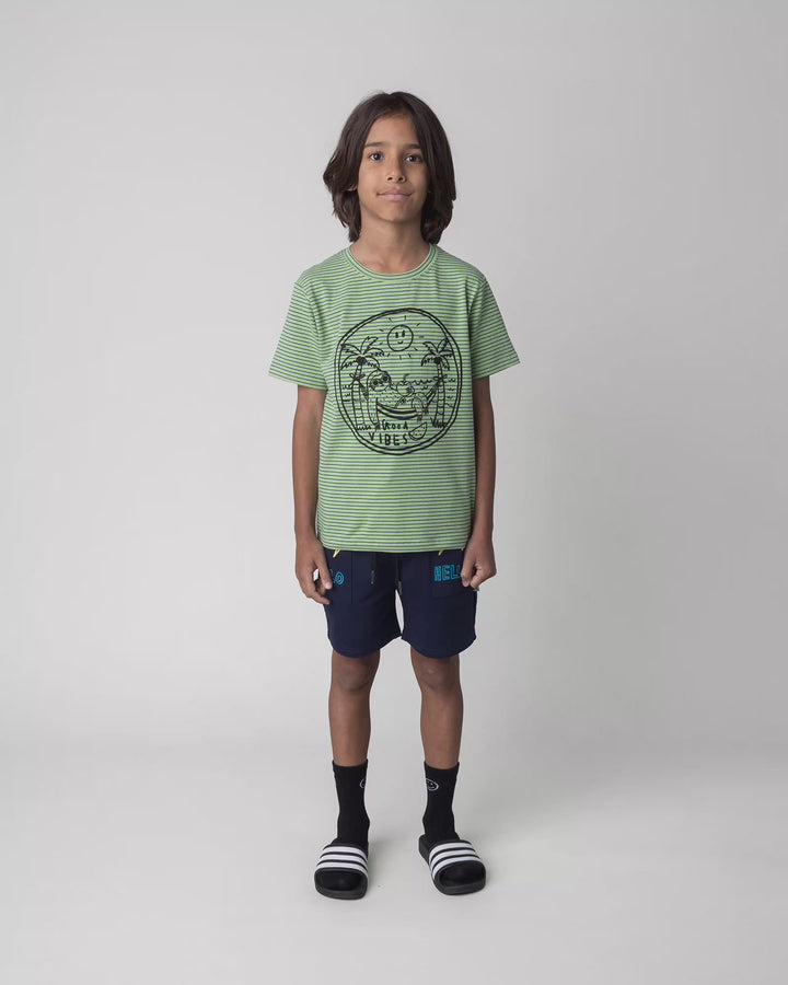 Kid wearing the Badges Short in ink, full circle video