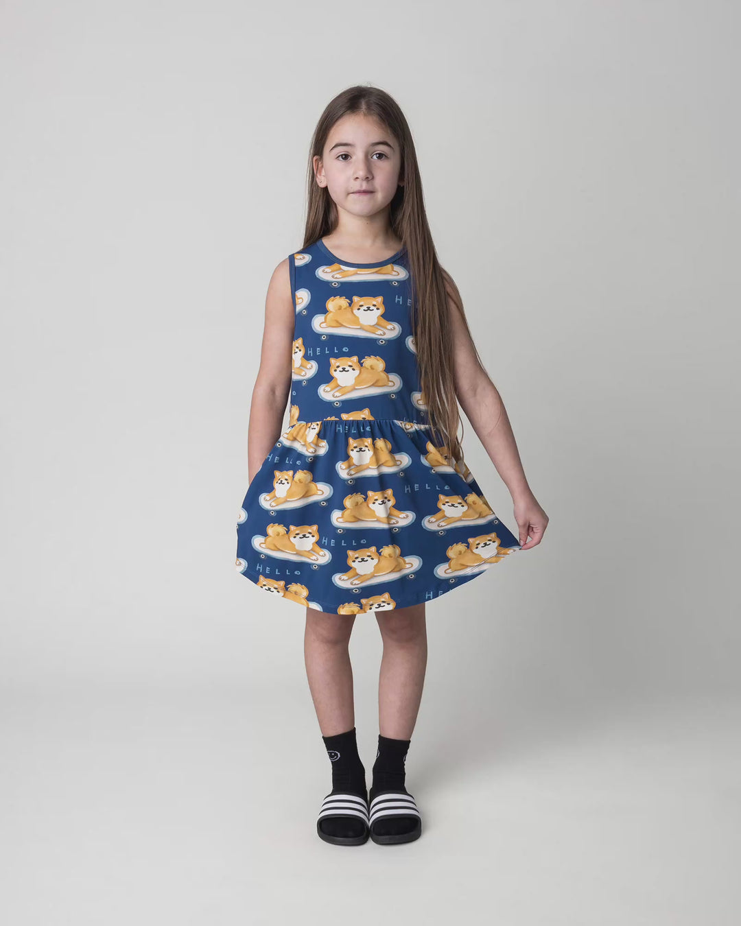 Kid wearing the Skate Puppy Dress in midnight, full circle video