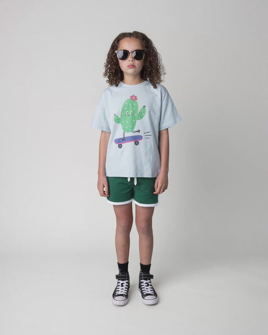 Kid wearing the Skate Cactus Tee in light blue, full circle video