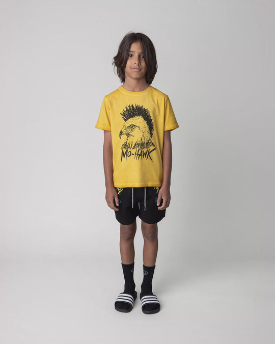 Kid wearing the Mo-Hawk Tee in mustard wash, full circle video