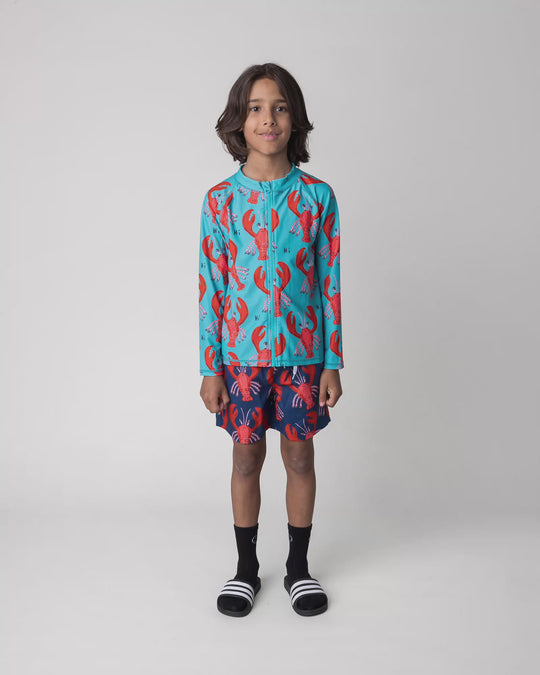 Kid wearing the Vacay Crayfish Rashie, full circle video