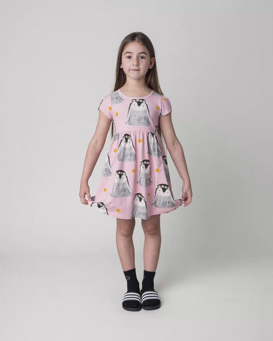 Kid wearing the Flower Penguin Dress in pink, full circle video