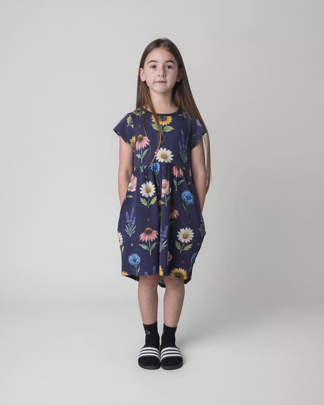 Kid wearing the Flower Friends Dress in ink, full circle video