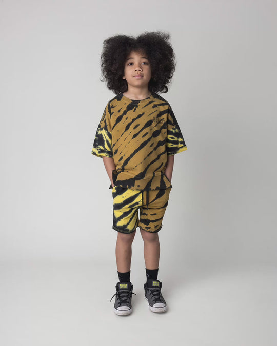 Kid wearing the Duo Tie Dye Short Sleeve Crew in lemon and rust, full circle video