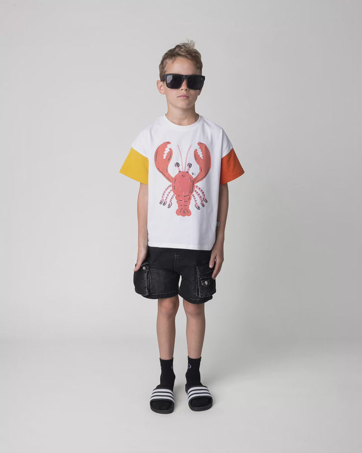 Kid wearing the Vacay Crayfish Tee in off white, full circle video