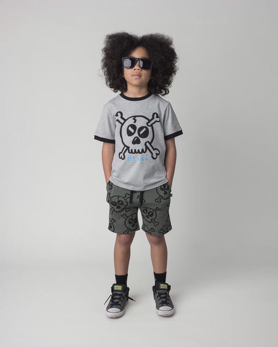 Kid wearing the Hello Skull Short in forest, full circle video