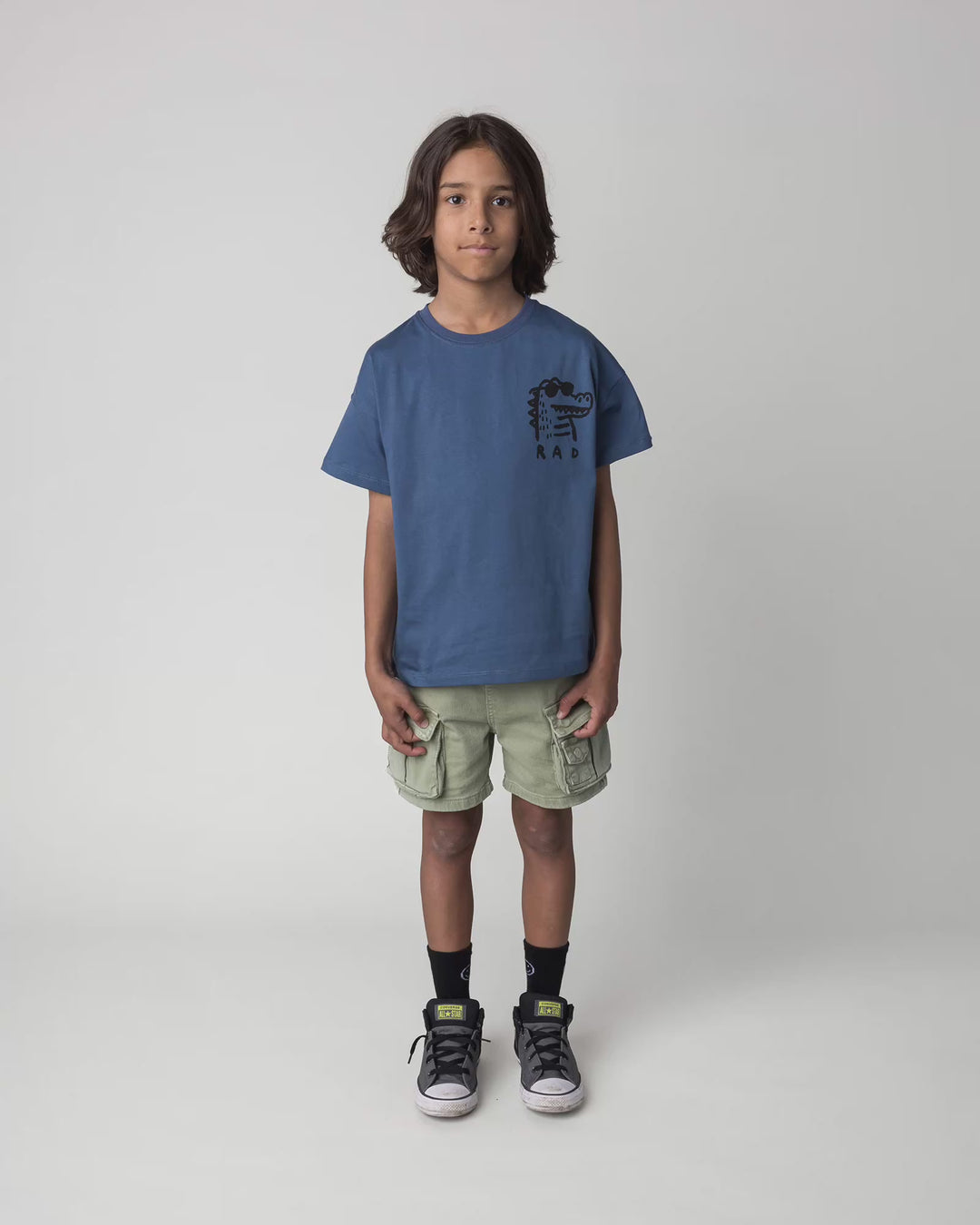 Kid wearing the Rad Croc Tee in blue, full circle video