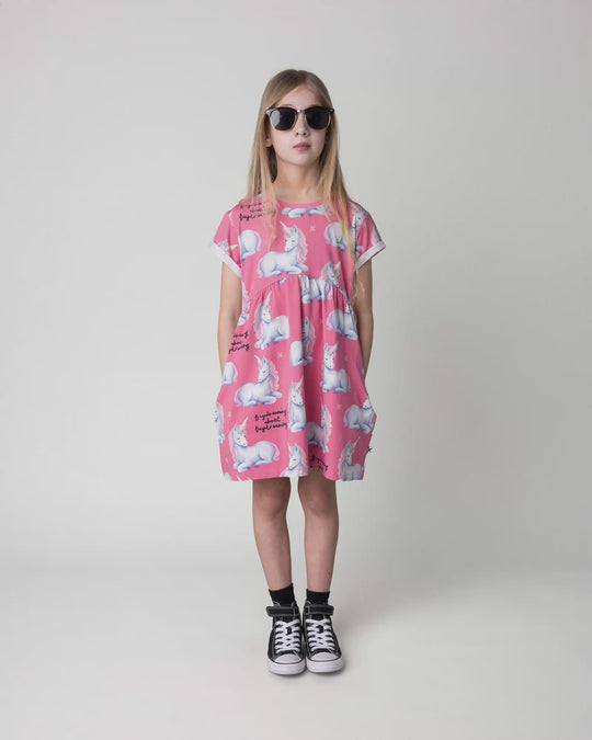 Kid wearing the Daydreaming Unicorn Dress in candy, full circle video