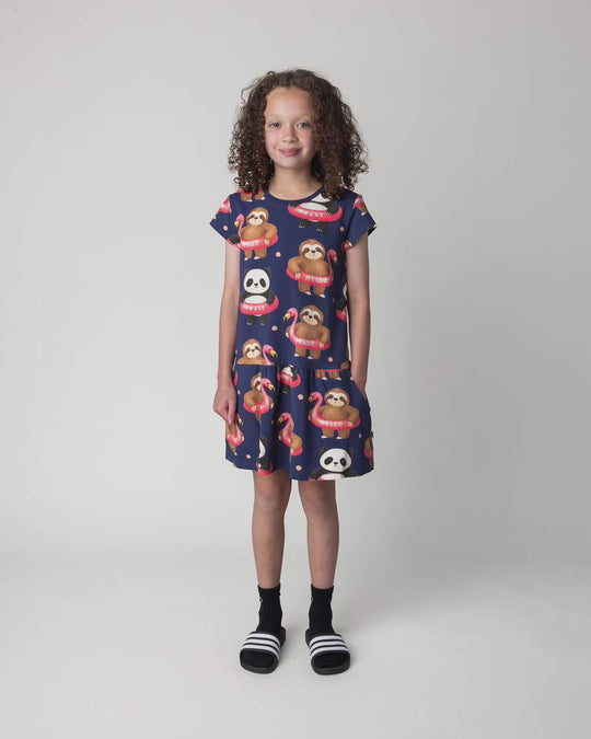 Kid wearing the Swimming Buddies Dress in midnight, full circle video